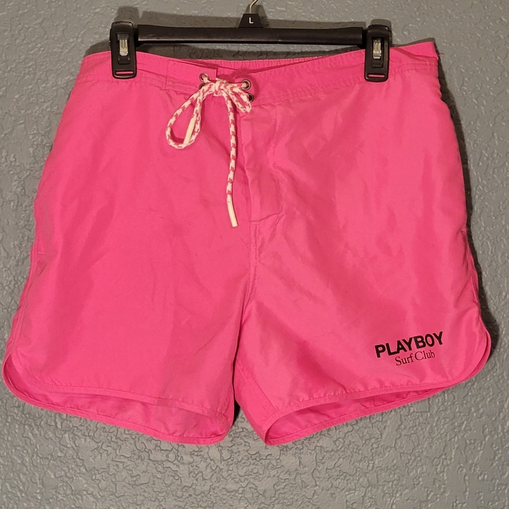 Hot pink Playboy Surf Club board shorts, size L.